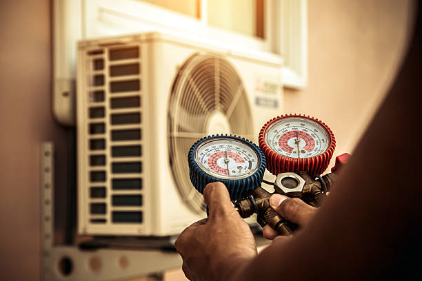 Professional Ductwork Repair technician working in Lewiston, ME